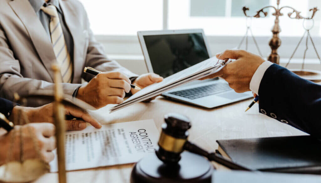 Businessmen and lawyers discuss contract documents. sign a business contract.