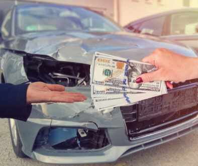 Business vehicle involved in an accident illustrating liability and insurance responsibility for company-owned cars.