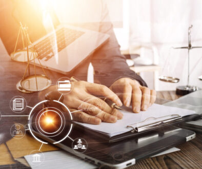 Business and lawyers discussing contract papers with brass scale on desk in office. Law, legal services, advice, justice and law concept picture with film grain effect